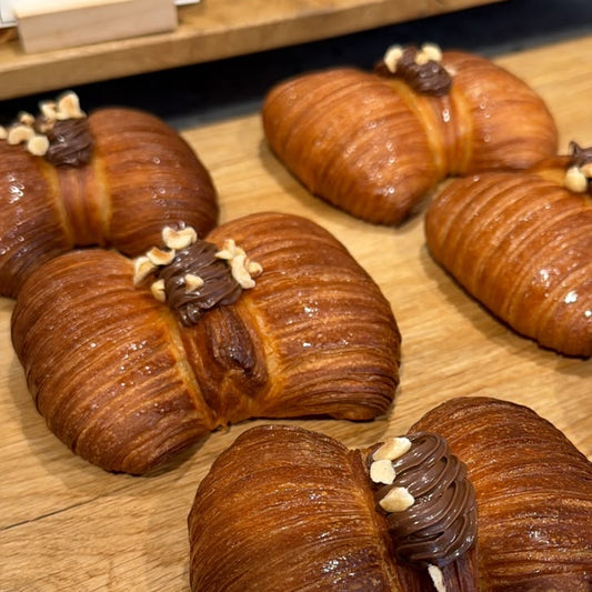Moñito de grasa con dulce de leche